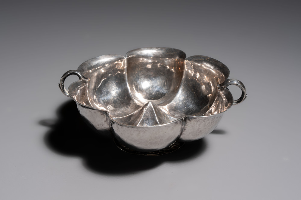 An Italian silver lobed footed bowl with handles, mark of the crossed Keys of St. Peter under a liturgical umbrella, Papal States, Rome, 18th C.