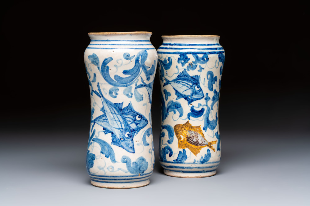 A pair of unusual blue, white and polychrome Italian maiolica 'fish' albarelli, 18th C.