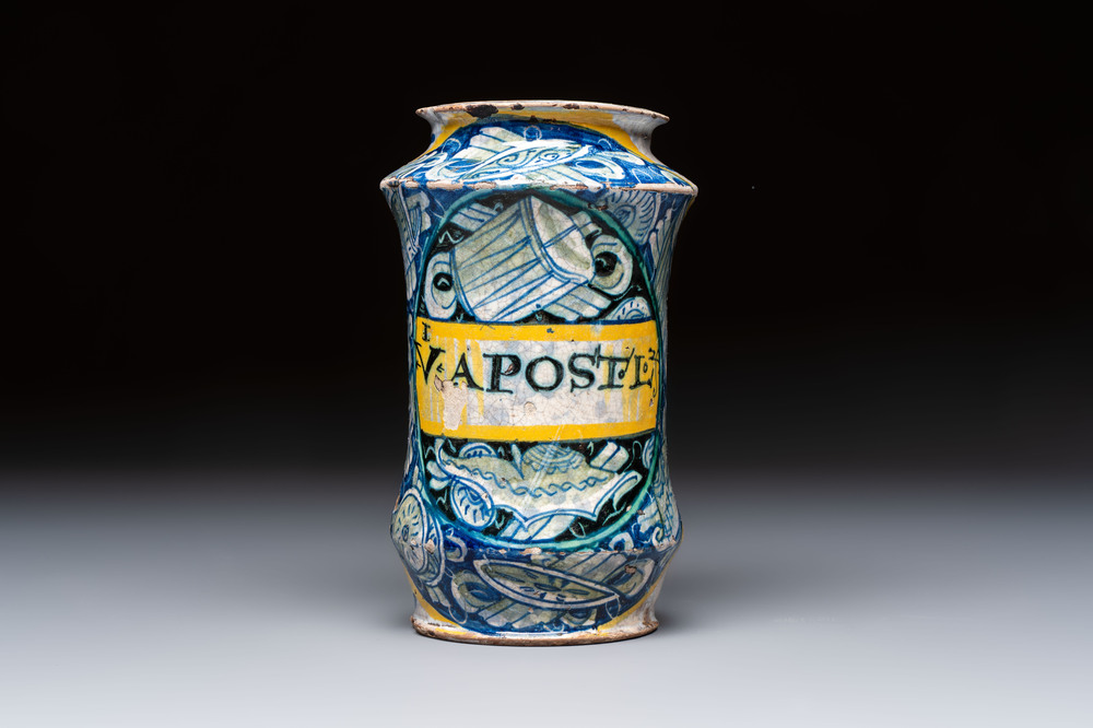 A polychrome Italian maiolica 'a trofei' albarello, inscribed V. APOSTL, Deruta, late 16th C.
