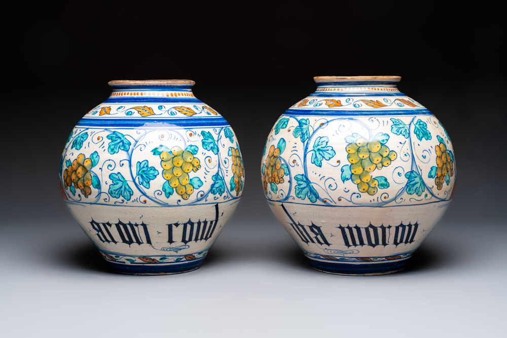 A pair of large polychrome Italian maiolica drug jars with grapevines, Venice, 3rd quarter 16th C.