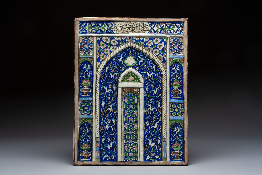 A very large inscribed rectangular moulded Qajar 'mihrab' tile inscribed Sultan Abu Saeed Khan, 19th C.