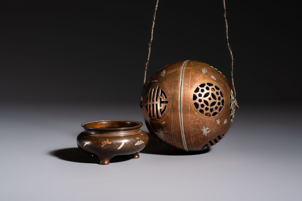 A Chinese or Vietnamese silver-inlaid copper reticulated spherical censer and a silver- and copper-inlaid bronze tripod censer, 19th C.