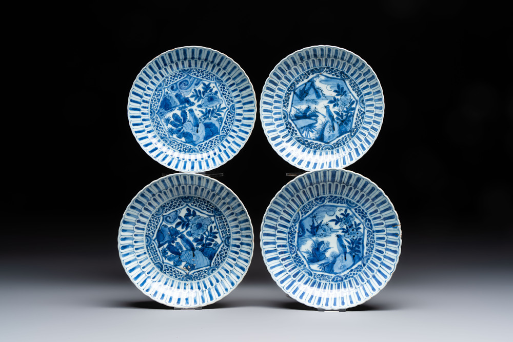 Four Chinese 'Kraak' blue and white plates with a bird on a rock, Wanli