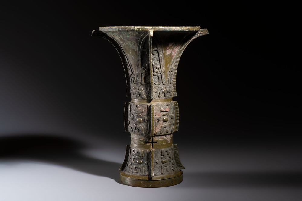 A Chinese archaic bronze wine vessel with Taotie design, Zun 尊, late Shang