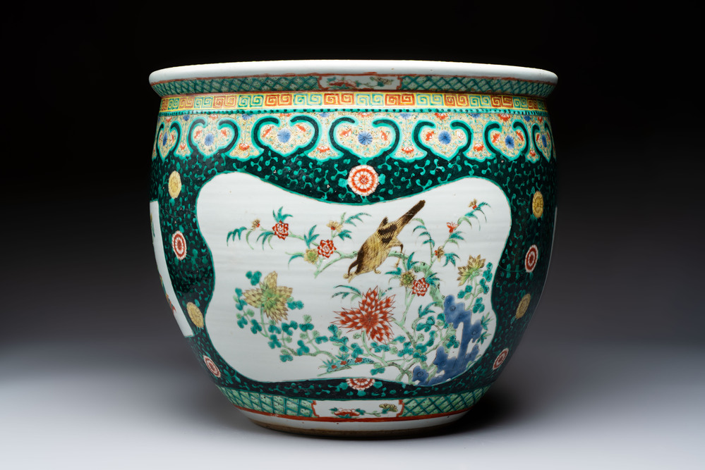 A Chinese famille verte black-ground jardini&egrave;re with birds, antiquities and flowers, 19th C.