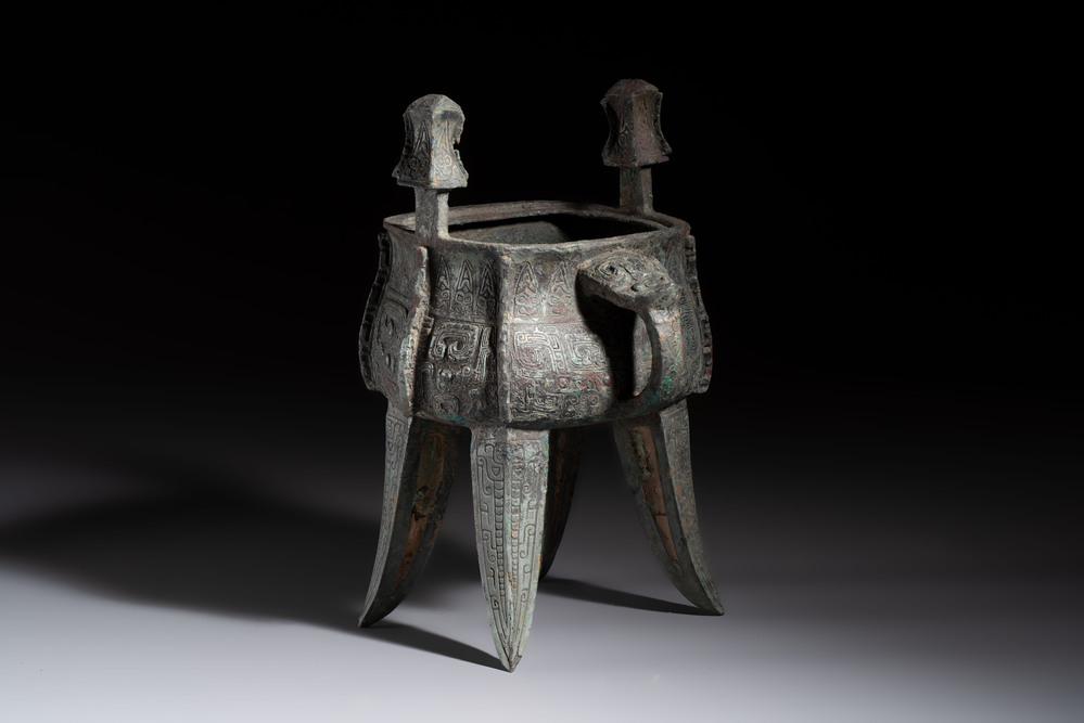 A Chinese archaic bronze wine vessel with owl design, Jia 斝, late Shang