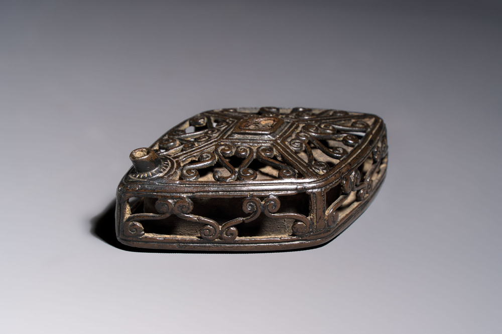 A Chinese openworked double-walled lozenge-shaped bronze water dropper, Ming
