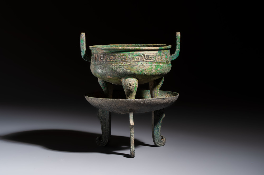 An inscribed Chinese archaic bronze food vessel and stand, You Pan Ding 有盤鼎, Western Zhou