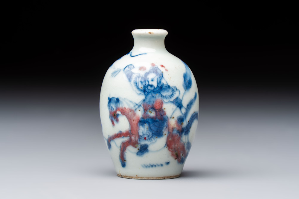 A Chinese blue, white and copper-red 'Romance of the Three Kingdoms' snuff bottle, Yongzheng mark, 19th C.