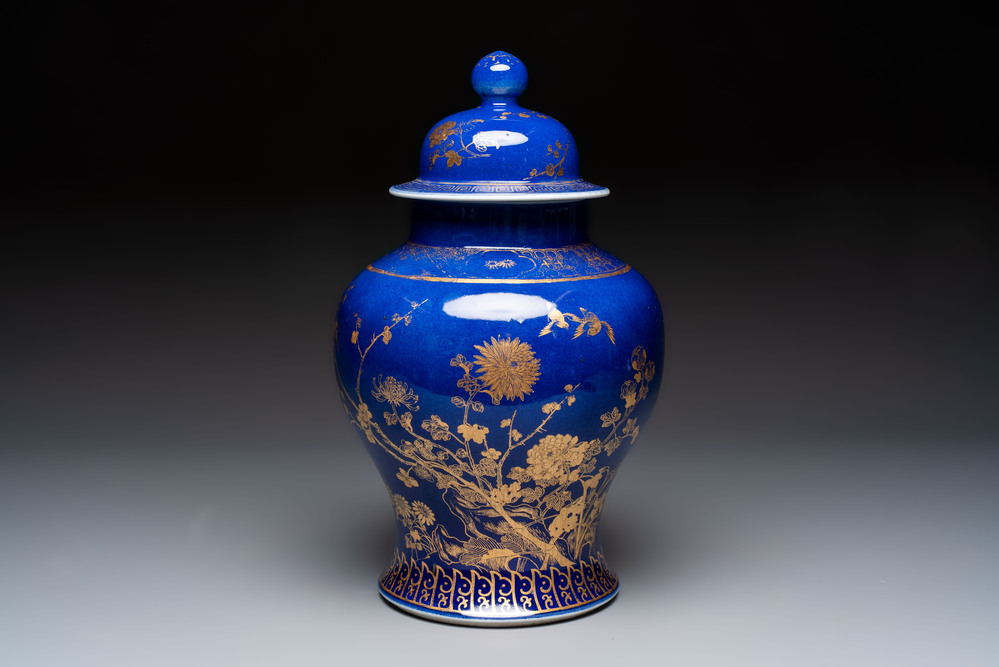 A Chinese gilt-decorated powder-blue-ground vase and cover, Kangxi mark, 19th C.
