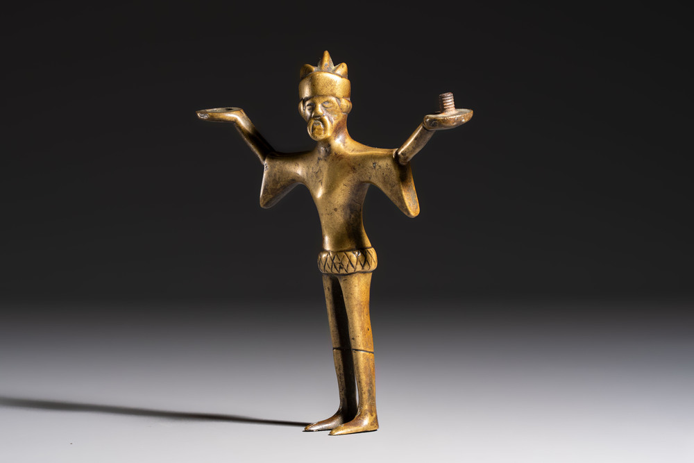 A Gothic bronze figural candlestick stem, Flanders, 15th C.