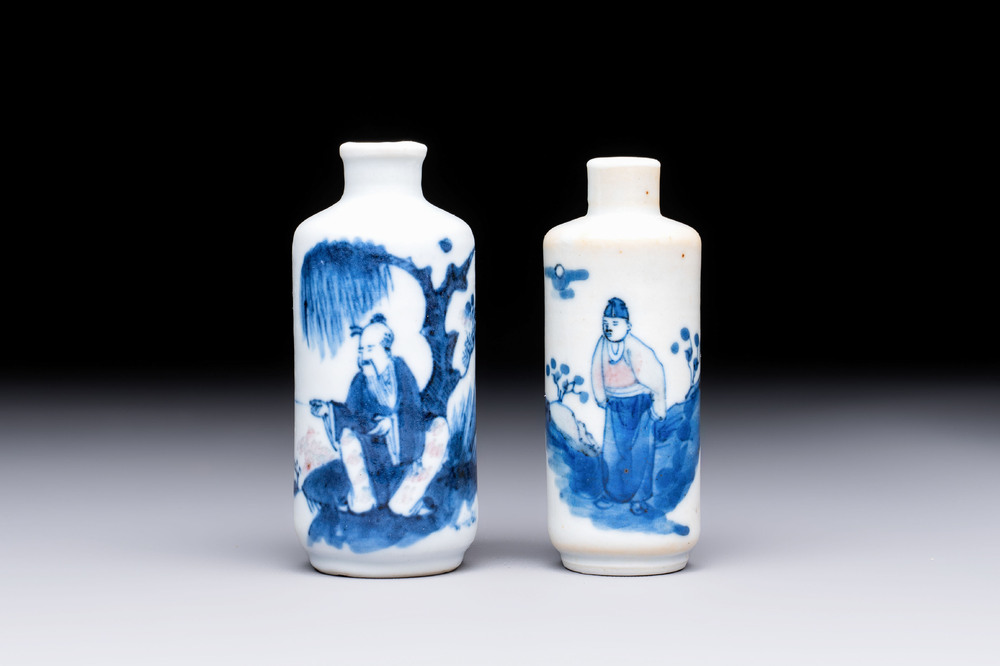 Two Chinese blue, white and copper-red snuff bottles with figural design, 19th C.