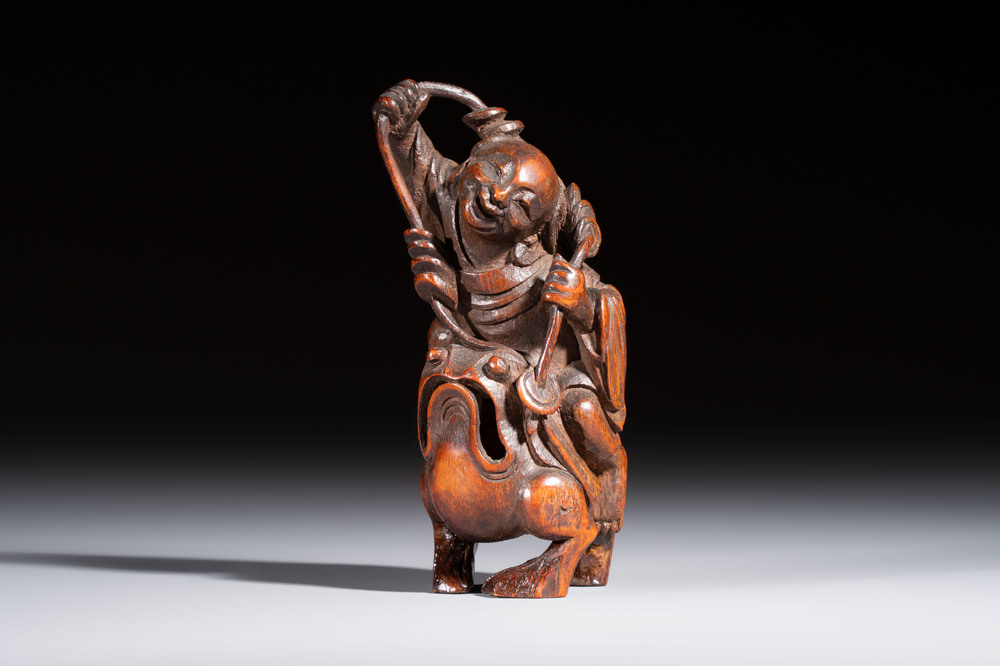 A small Chinese carved bamboo group of 'Liuhai', 19th C.