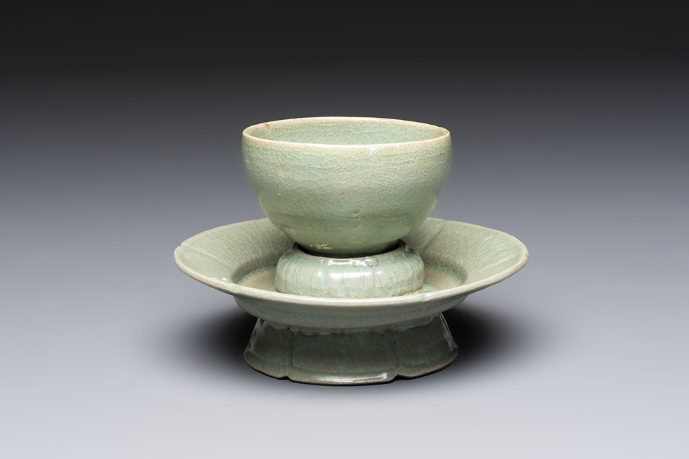 A fine Korean celadon tea bowl with its original stand, Goryeo, 12th C.