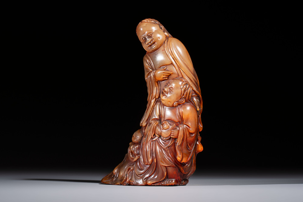 A Chinese carved buffalo horn 'Hehe Erxian' group, 17/18th C.