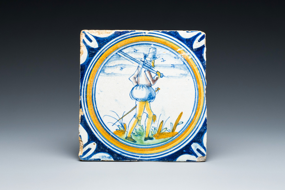 A polychrome Dutch Delft maiolica 'Soldier' medallion tile, 16th C.
