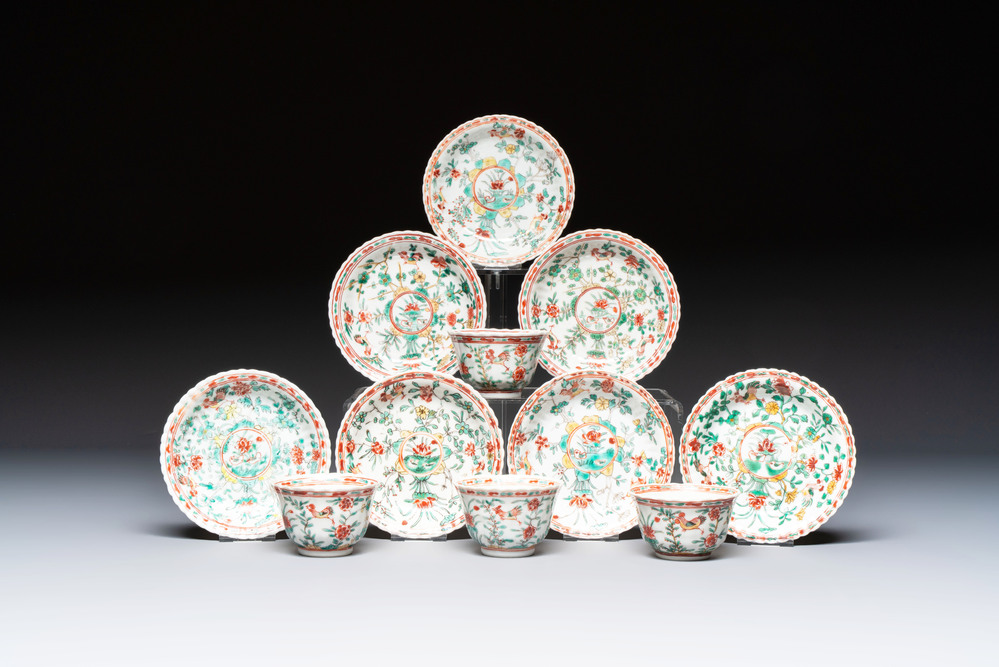 Four Chinese famille verte cups and seven saucers, 19th C.