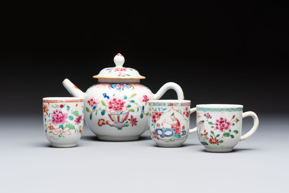 A Chinese famille rose teapot and cover with floral design and three cups, Qianlong