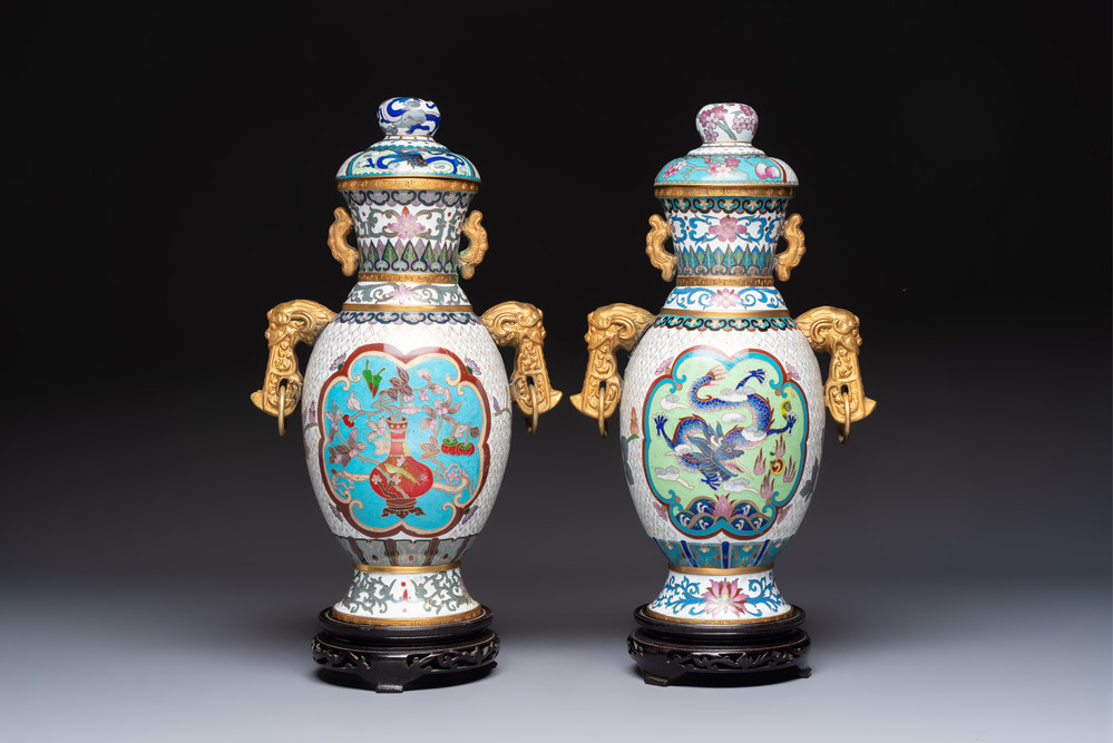 Two Chinese cloisonn&eacute; vases on wooden stands, 20th C.