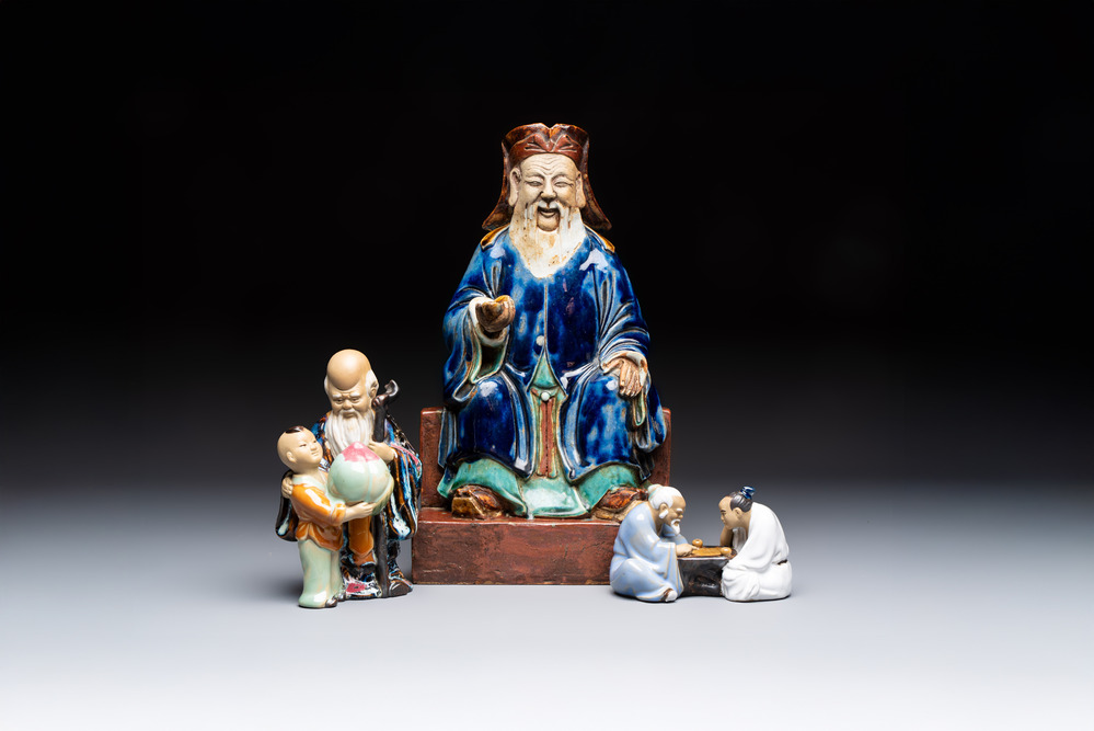 A Chinese polychrome-glazed Shiwan stoneware figure of Tudigong, a 'Shoulao' group and a 'Go Players' group, China marks, 19/20th C.