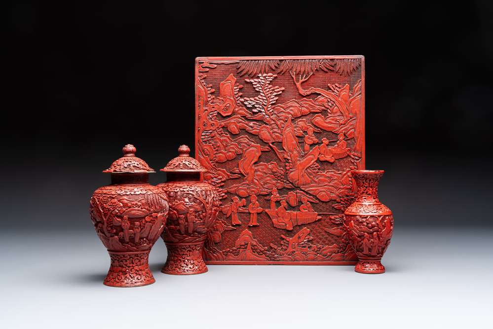 A Chinese cinnabar lacquer plaque, a vase, and a pair of covered vases, 19/20th C.