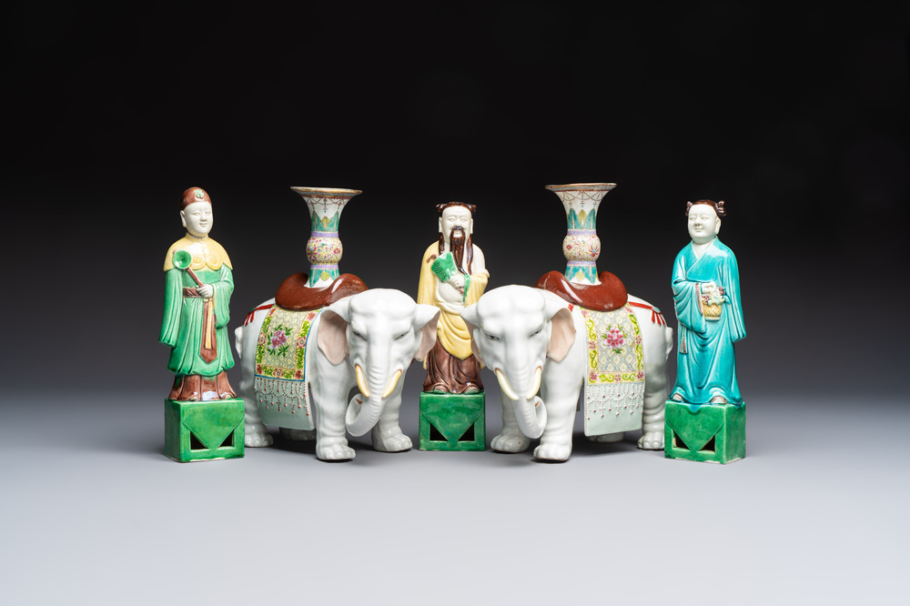 A pair of Chinese famille rose elephants carrying a 'Gu' vase and three sancai-glazed immortals, 20th C.