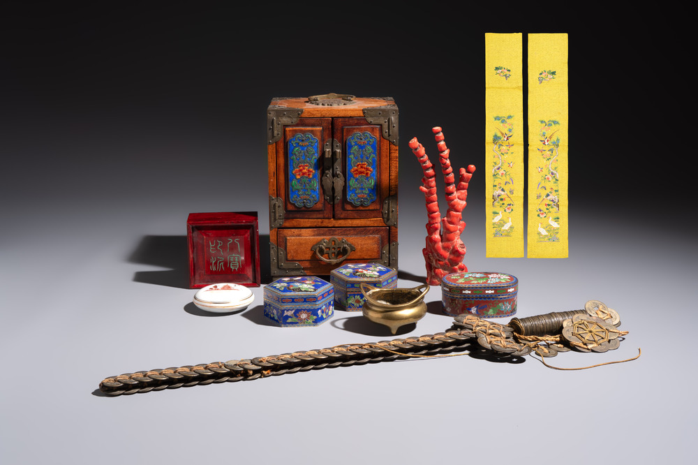 A group of eleven Chinese decorative objects, including bronze, cloisonn&eacute;, wood, and silk, 20th C.