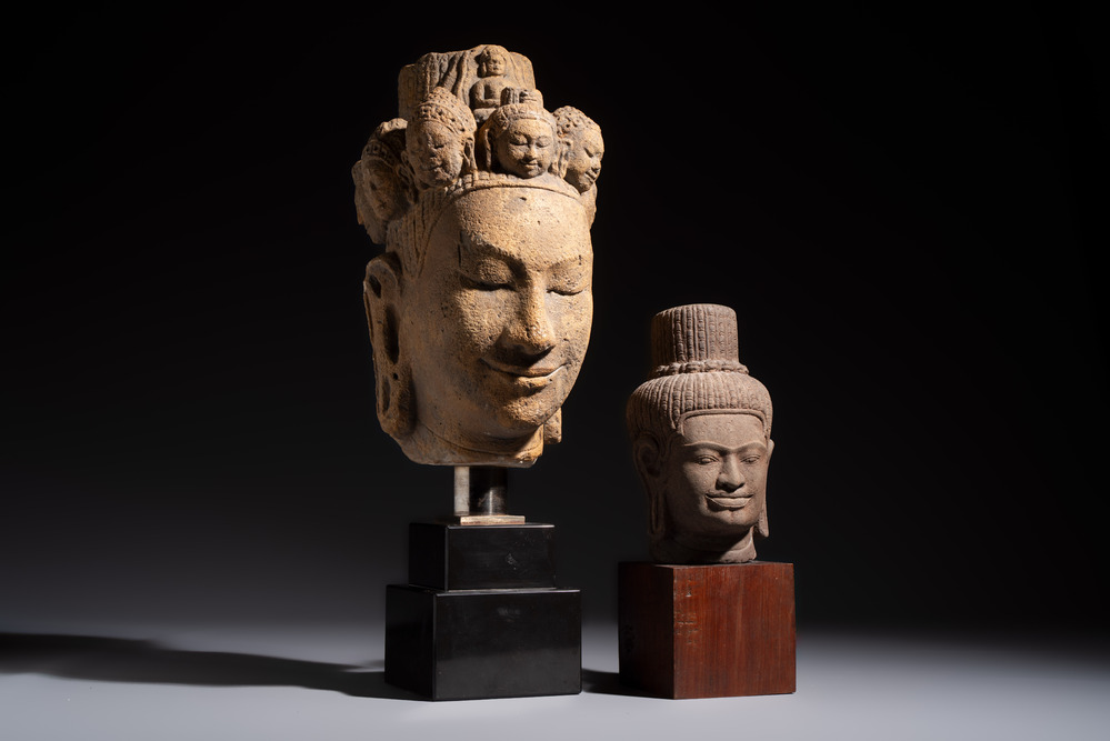 A Khmer-style carved stone head and a carved stone head of a deity, Thailand and Cambodia, 20th C. or earlier