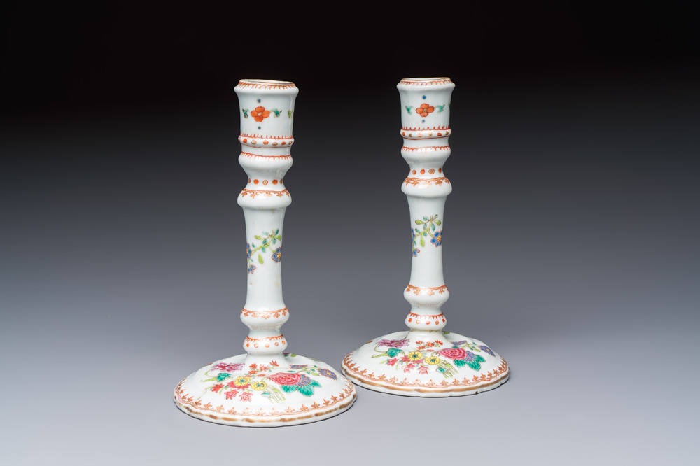 A pair of Chinese famille rose candlesticks with floral design, Qianlong