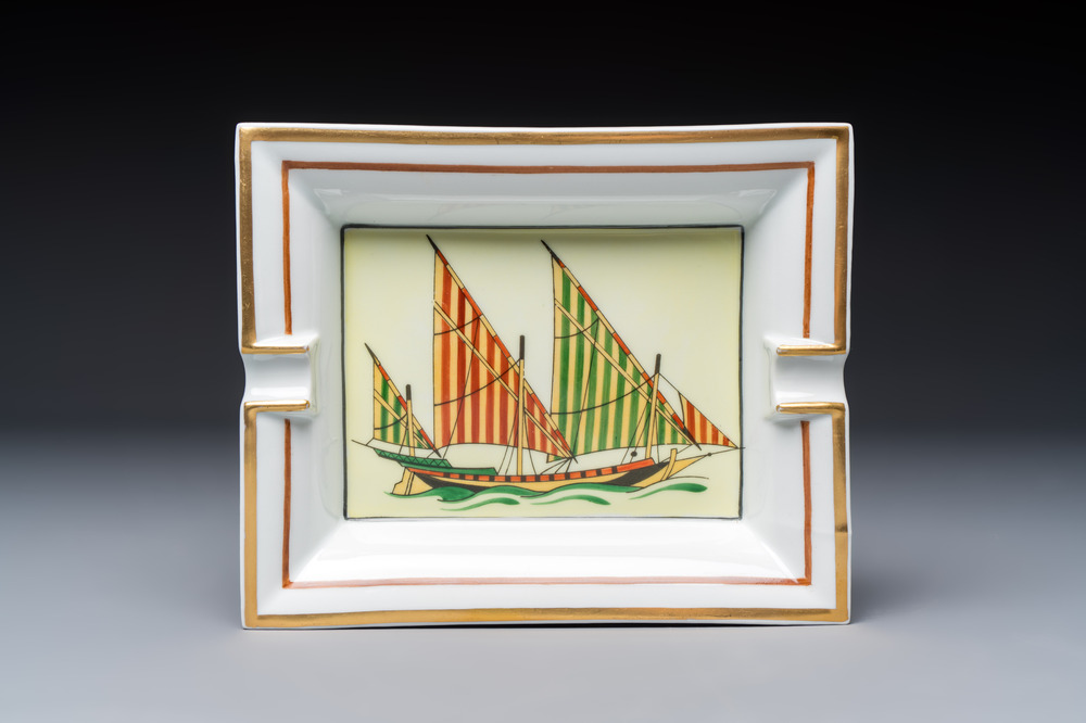 A gilt and polychrome-decorated porcelain 'Yacht' ashtray, Herm&egrave;s, 20th C.