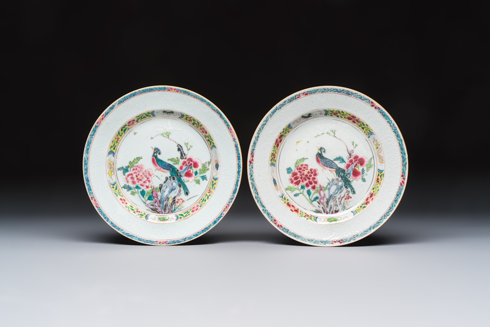 A pair of Chinese famille rose 'Peacock and Flowers' plates, Yongzheng