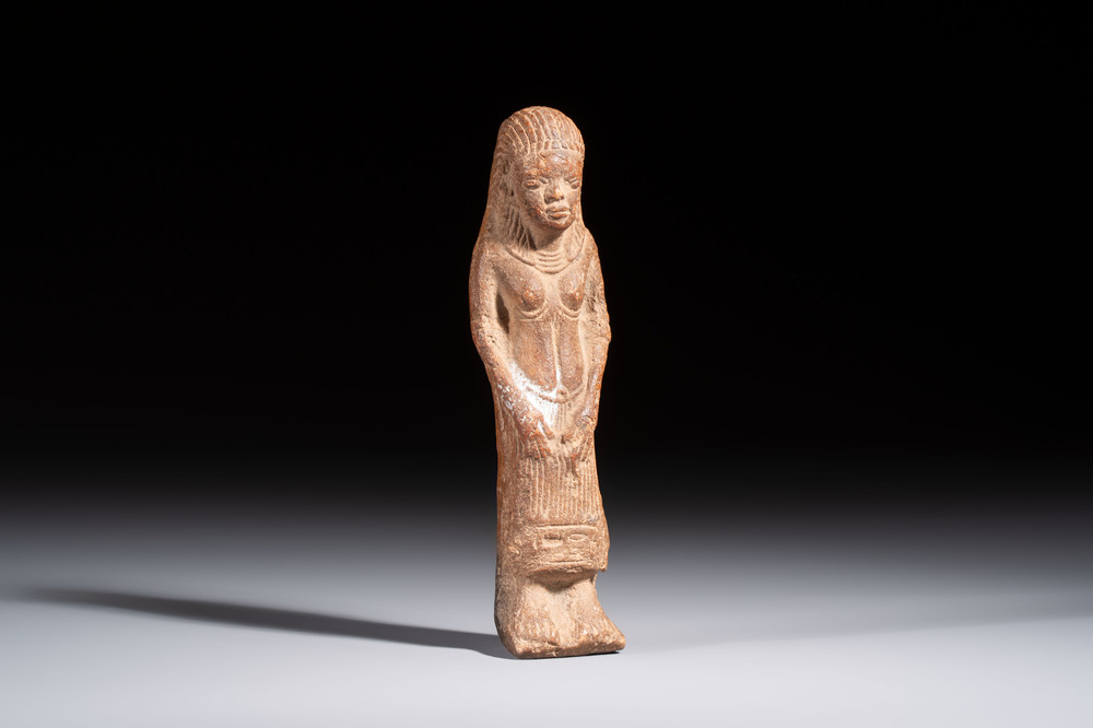 A red-brown clay Ushabti, probably Romano-Egyptian, 1st C.