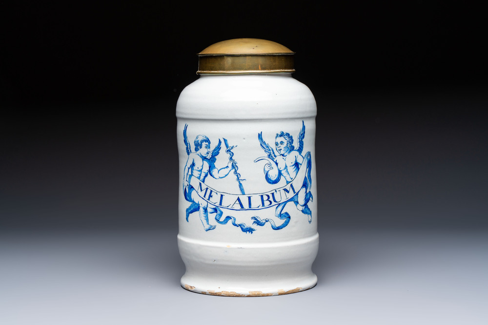 A large blue and white Dutch Delft albarello and cover inscribed 'MEL ALBUM', 18th C.