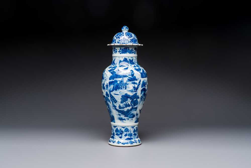 A Chinese blue and white covered vase with figures in landscapes, Kangxi