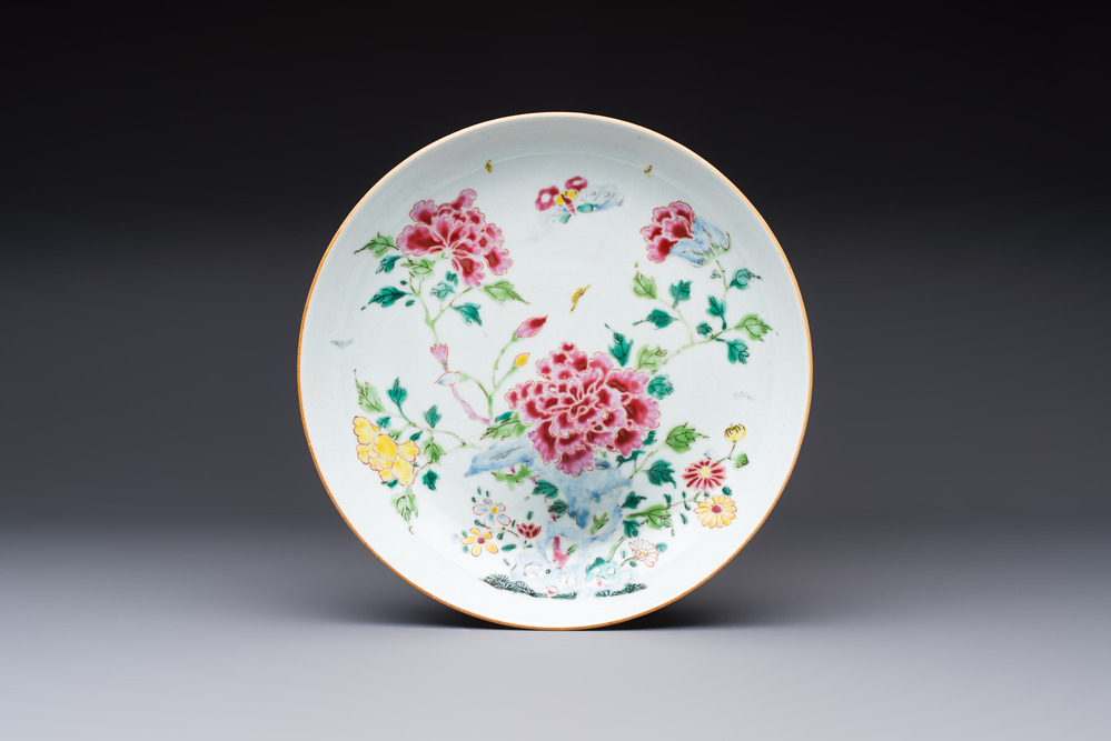 A Chinese famille rose 'Peonies' plate, Yongzheng/Qianlong