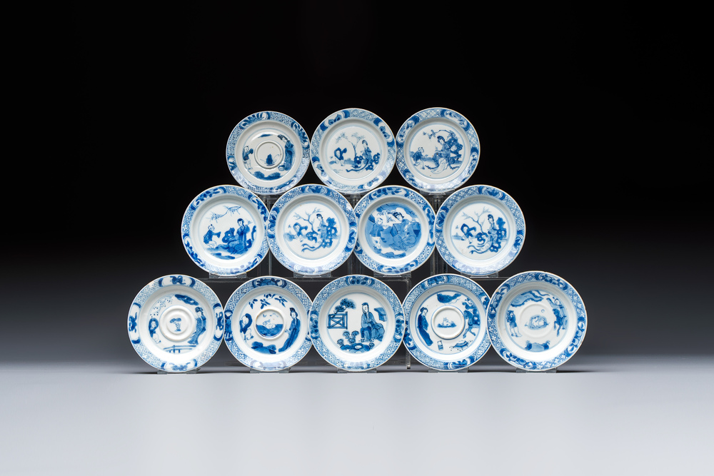 12 Chinese blue and white saucers with figural design, lingzhi and Chenghua marks, Kangxi
