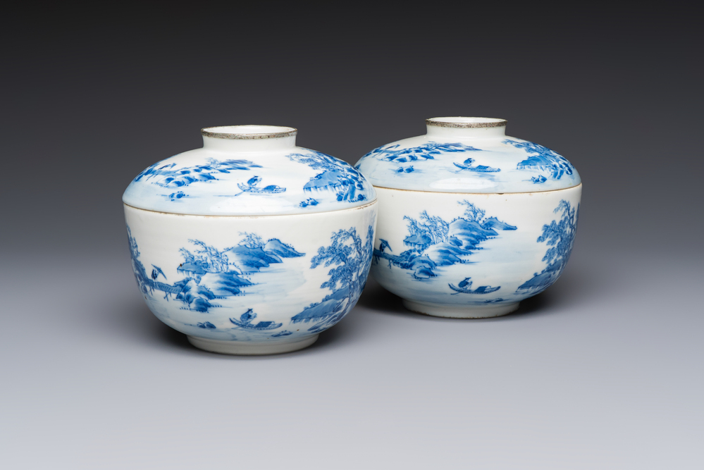 A pair of Chinese blue and white 'Bleu de Hue' covered bowls with landscape design, Phong Vu Quy Chu 風雨歸舟 marks, 19th C.