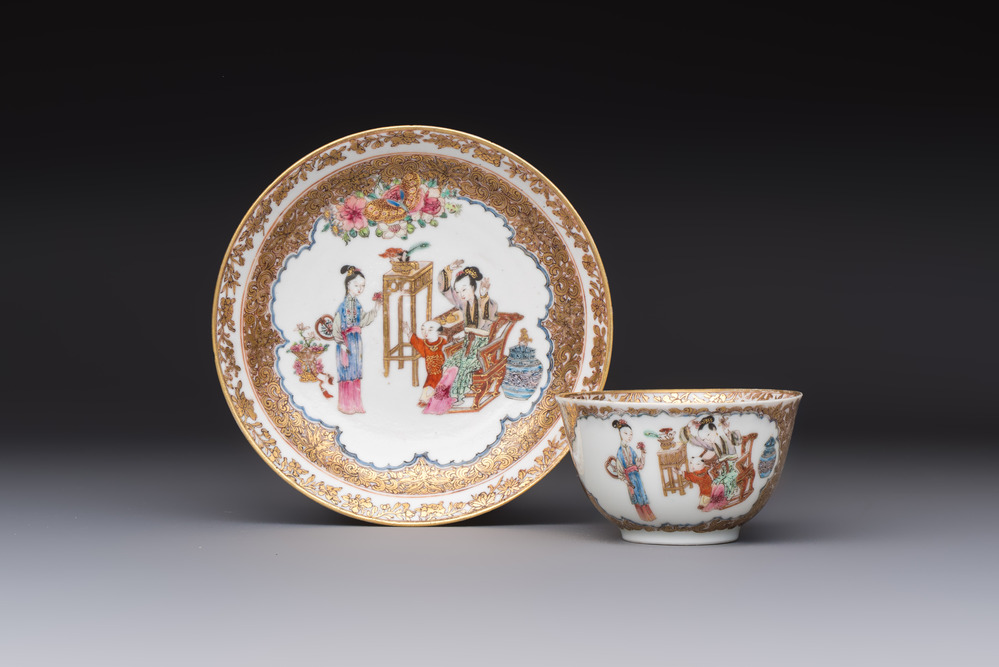 A fine Chinese Canton famille rose gilt-decorated cup and saucer with figural design, Yongzheng/Qianlong