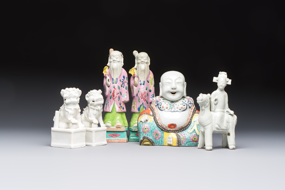 Two Chinese Dehua blanc-de-Chine Buddhist lions, three famille rose figures, and a white-glazed group, Kangxi and later