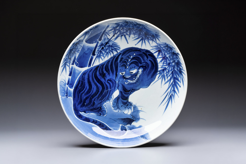 A large Japanese Arita blue and white 'Tiger' dish, Fuuki Chousun 富貴長春 mark, late Edo to early Meiji, 18/19th C.
