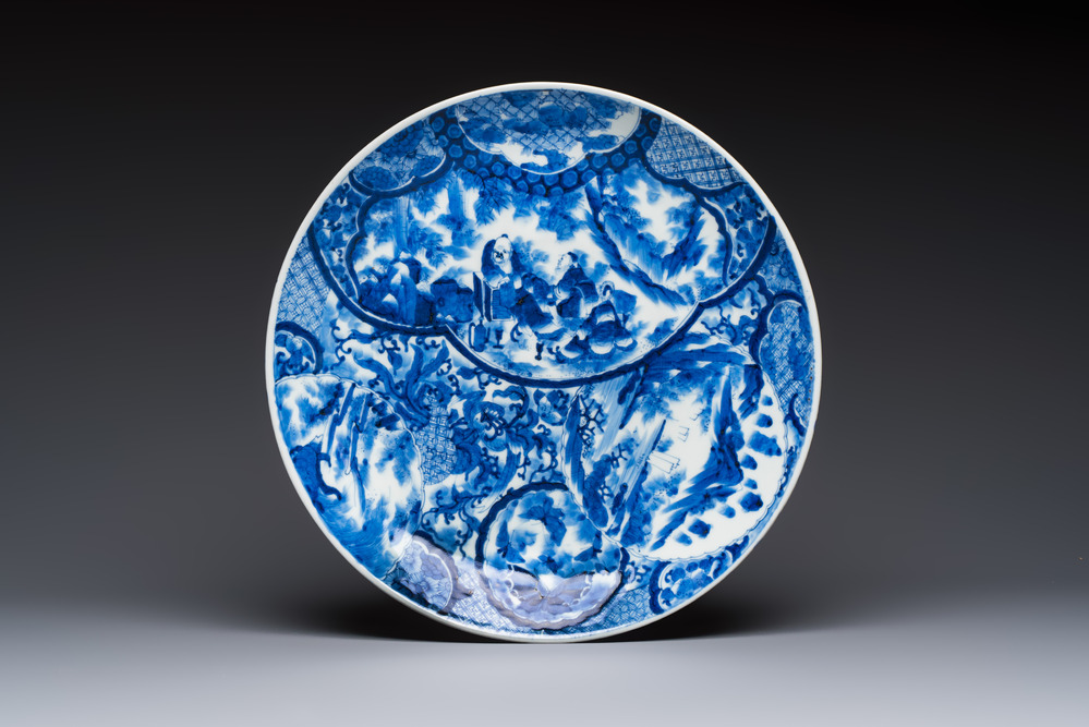 A Japanese blue and white dish with narrative design, Meiji, 19th C.