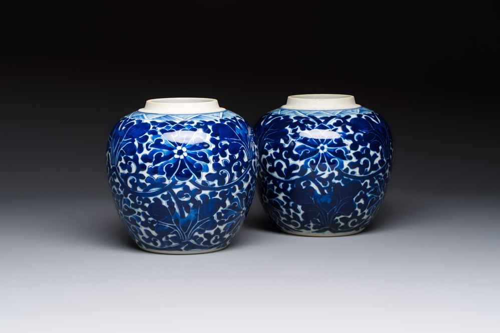 A pair of Chinese blue and white 'Lotus Scroll' jars, 19th C.