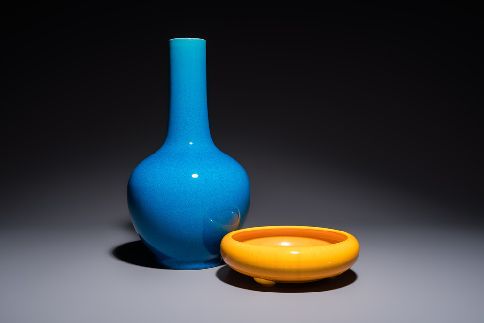 A Japanese Awaji orange-glazed brush washer, marked, and a blue-glazed vase, 19/20th C.