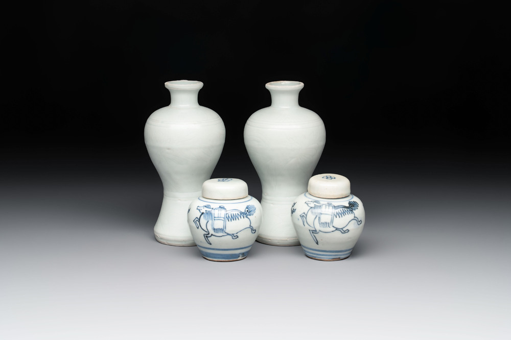 A pair of Chinese incised white-glazed 'Meiping' vases, Wanli mark and of the period, and a pair of blue and white covered jarlets, Ming