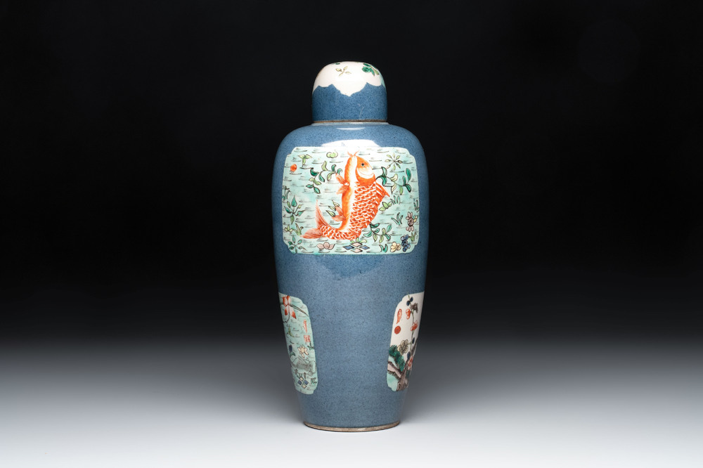 A Chinese famille verte powder-blue-ground 'Fish and Bird' vase and cover, 19th C.