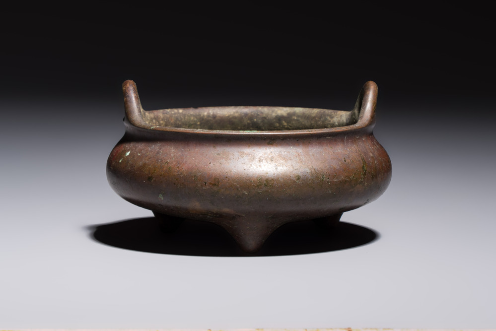 A Chinese bronze handled tripod censer, Yu Tang Jing Wan 玉堂精玩 mark, 17th C.