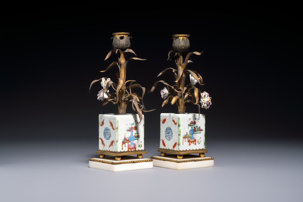 A pair of gilt silver and metal candlesticks with Chinese porcelain, European porcelain flowers, and marble bases, marked Boin-Taburet, late 19th C.