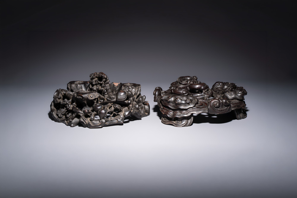Two large Chinese carved wooden stands, 19th C.