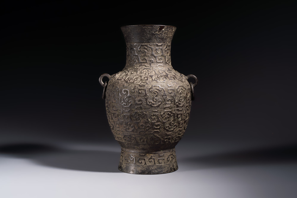 A Chinese archaistic bronze vase with Taotie handles, 'Hu 壺', Ming