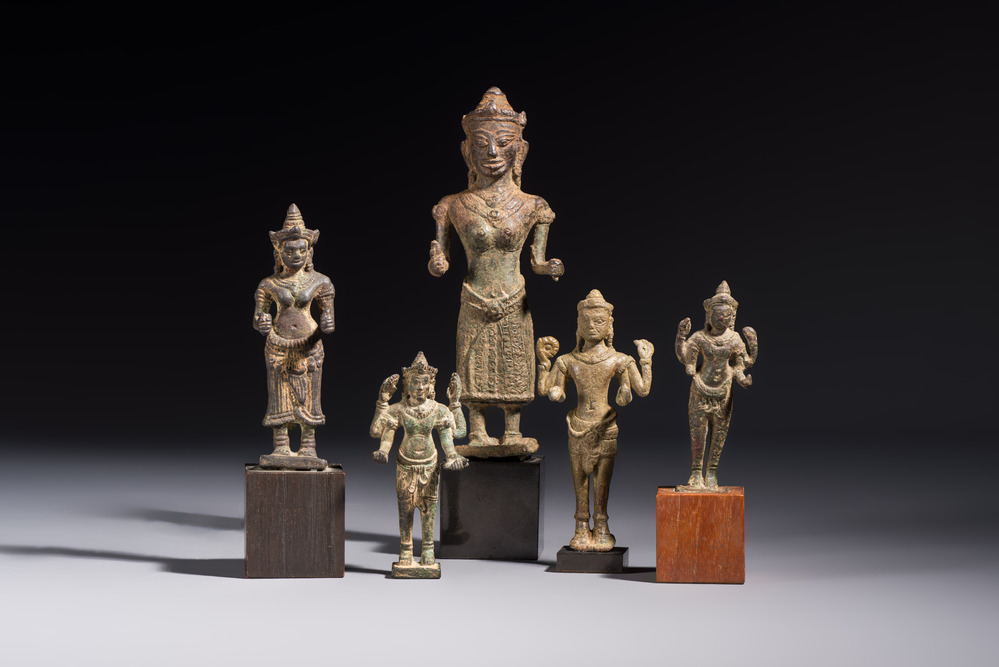 Five bronze figures of divinities, probably Cambodia, 12/13th C.